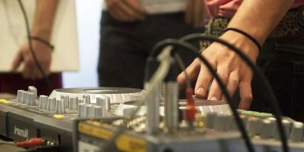 Students on a soundboard